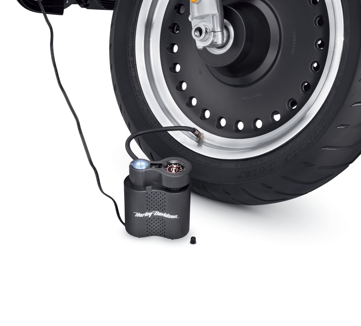 Harley-Davidson® Compact Air Compressor with Light -  12700020.  Correct tire pressure is crucial to the safe operation and long tire life, but checking the pressure, finding a gas station with a working air pump, and filling the tire is a chore that many of us ignore. Harley-Davidson®'s Air Pump is designed to simplify this necessary procedure.